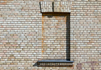 Part of the wall of an old building made of bricks