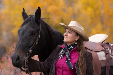 Fototapeta premium Pretty Cowgirl in the Fall