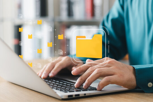 Document management system concept, business man holding folder and document icon software, searching and managing files online document database, for efficient archiving and company data.