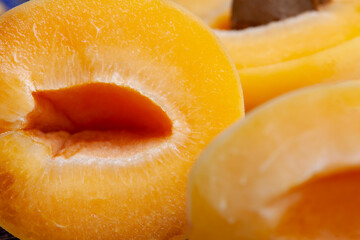 Ripe orange apricot cut into pieces