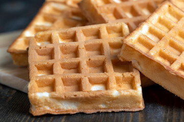 square sweet soft waffles on the table