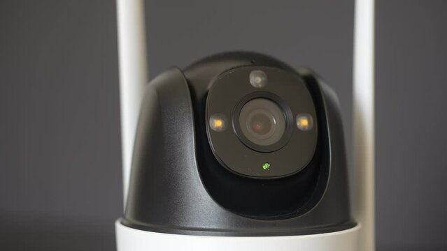 Close-up home security camera 360 on background. CCTV security camera. Technologies for monitoring and protection of territory