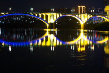 brige over river at night