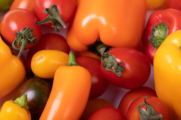 Full frame shot of fresh tomatoes with bell peppers, copy space