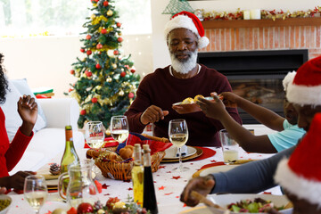 Multi generation african american family in dining room