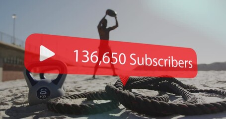 Speech bubble with increasing subscribers against african american fit man working out at the beach