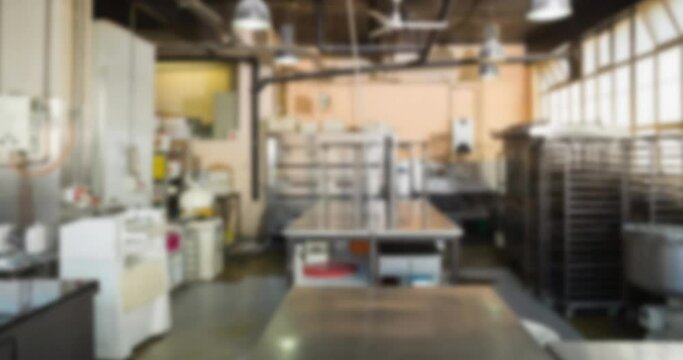 Animation of blurred interior of empty kitchen in restaurant