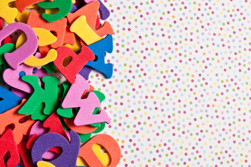 colorful scattered alphabet letters, back to school concpet