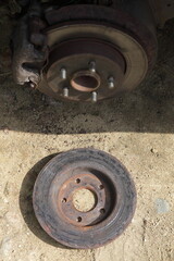 Car brake system repair - used unvented brake disk and normal brake disc