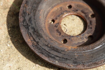 Destroyed car brake disc corrosion close up