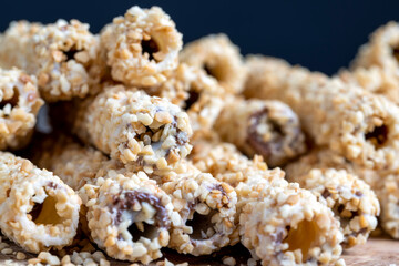 waffle tube with chocolate filling and crushed peanuts