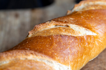 a whole wheat baguette, not cut into pieces