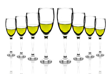 Yellow liquid wine glass on a white background