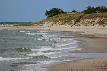 Seashore, sand dunes soft sunlight, clear sky idyllic seascape