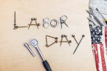 Labor day background design idea, roofing screws with tools and American flag pattern on jean pocket, celebrate staff holiday in America