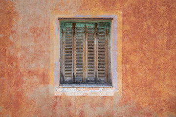 Fototapeta na wymiar Facade of a house in Lumio Corsica on the mediterranean sea