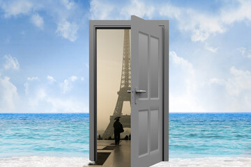 Fototapeta premium Open door with Eiffel Tower on sea 