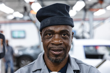 Portrait of a happy African American mechanic man