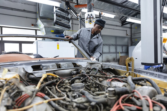 African American man mechanic senior man  - Powered by Adobe
