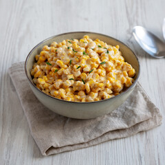 Homemade Slow Cooker Creamed Corn in a Bowl, side view.