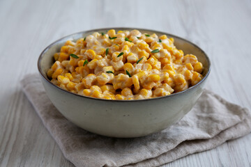 Homemade Slow Cooker Creamed Corn in a Bowl, low angle view. Close-up.