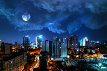 urban nightlife in the big city light under big blue moon lightstrike sky background