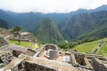Machu picchu, pre columbian inca site situated on a mountain ridge above the urubamba valley in...