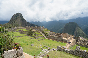 Machu picchu, pre columbian inca site situated on a mountain ridge above the urubamba valley in...