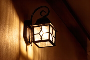 Close-Up Of Illuminated Lighting Equipment On Wall