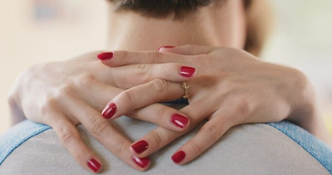 Love, couple and manicure hands around neck for support, intimacy and partnership connection close up. Woman with beauty red nails, trust and relationship people bonding together during alone time