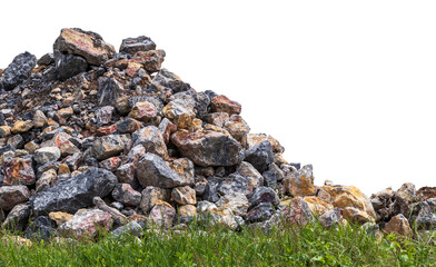 Isolates, close-up shots of small granite boulders, large mountains on weed grass with sky clouds in the background.