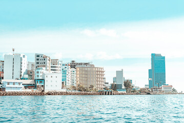 Fototapeta premium he Maldives and skyscrapers, transfer from the airport to the Islands by boat