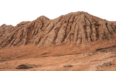 Mountain view isolates of large sand mounds eroded by rain are seen in the rainy season road renovation works in rural Thailand.