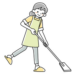 エプロンを着けてモップ掛けをする笑顔のシニア女性