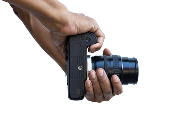 Isolated close-up view on white background. Male Thai photographer fingers holding a DSLR film camera to aim at something with tensed arms.