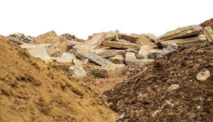 A pile of rubble isolates of concrete blocks obtained from the demolition of an old road was laid...