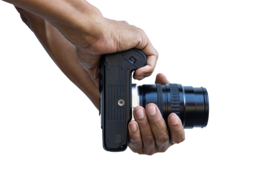 Isolated close-up view on white background. Male Thai photographer fingers holding a DSLR film camera to aim at something with tensed arms.