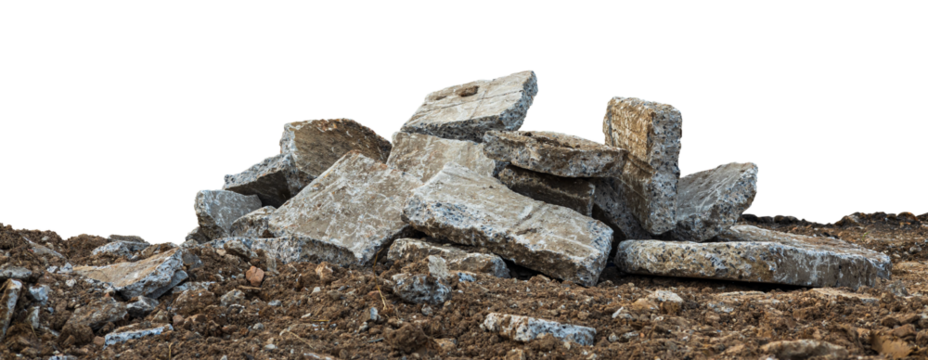 Low View Isolate Debris of large concrete blocks are piled up on the mounds of road demolition for renovations, which are common during the summer in rural Thailand.