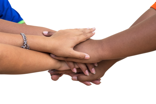 A close-up view of isolates, the hands of many Thai children are joining together in harmony and love to work together to achieve something well.