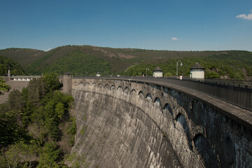 Fototapeta na wymiar Panorama of the dam and surrounding countryside in summer on a clear sunny day