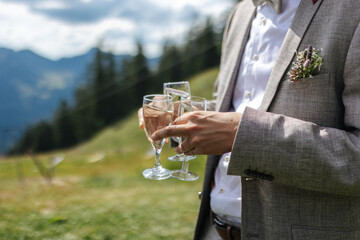 Alcoholic beverages at a wedding. Glasses and drinks at an event.