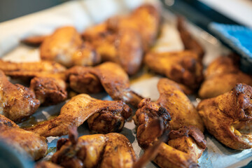 Home cooked chicken wings. Food and eating concept.