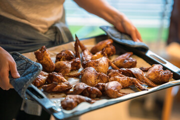 Home cooked chicken wings. Food and eating concept.