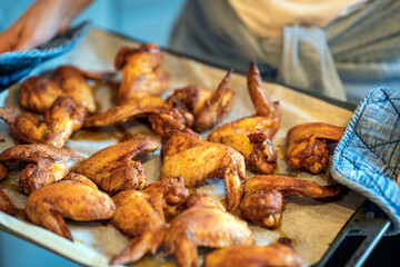 Home cooked chicken wings. Food and eating concept.