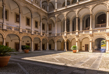 Palermo, Italy - July 6, 2020: Courtyard of Palazzo dei Normanni (Palace of the Normans, Palazzo...
