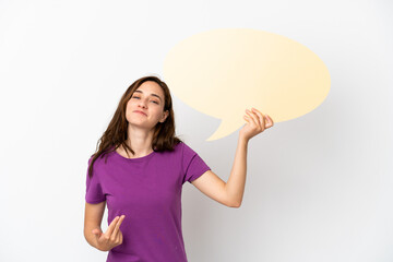 Young caucasian woman isolated on white background holding an empty speech bubble and doing coming gesture