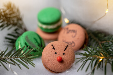 Christmas macarons on a cozy and warm background