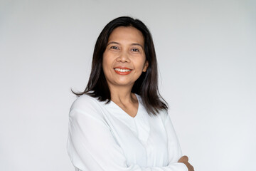 Business Woman Standing and Cross Her Arm with Sincere Smiling on White background
