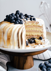 burnt meringue birthday cake with blueberries sweet torte vanilla cake happy feels peace of cake 