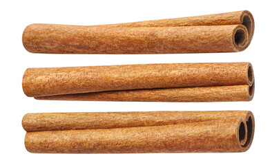 Set of delicious cinnamon sticks close-up, isolated on white background